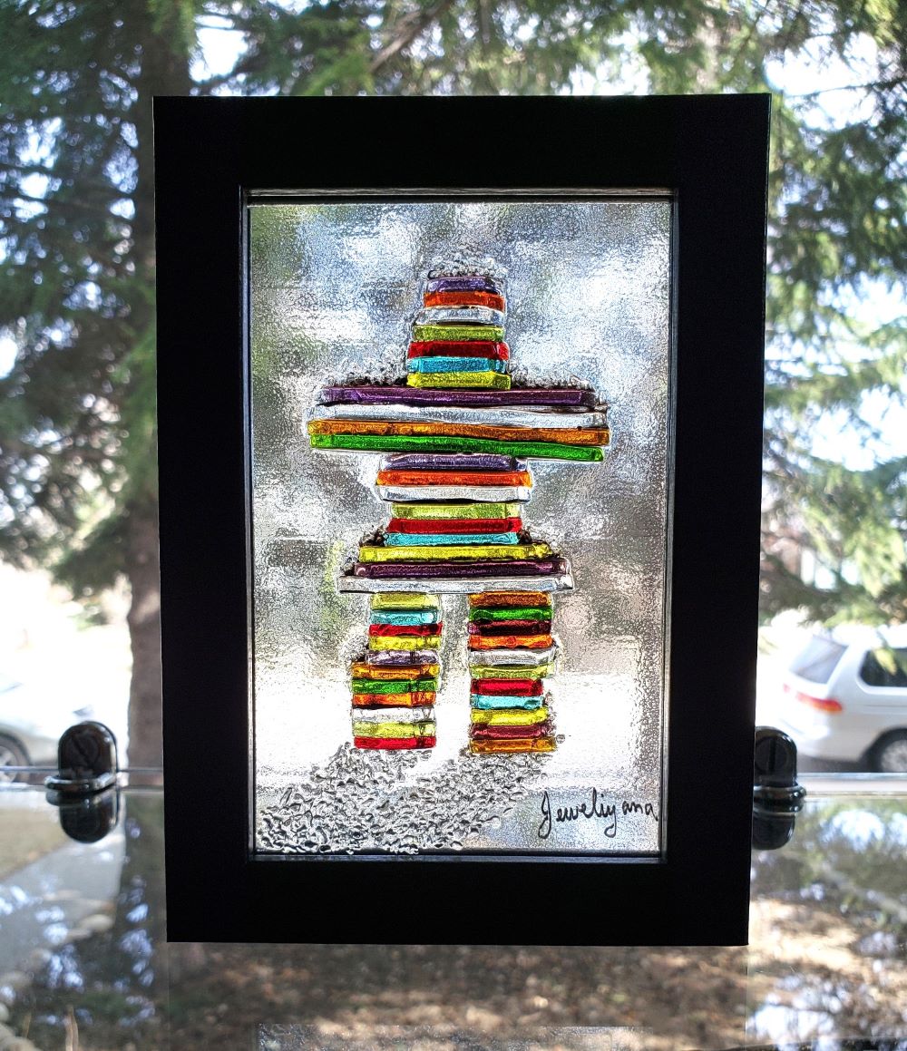 Rainbow glass inukshuk