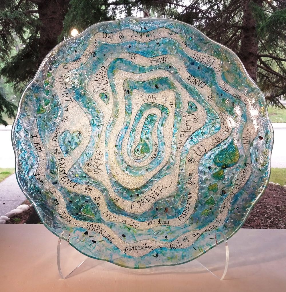 blue fusedglass bowl made by artist  jeweliyana reece