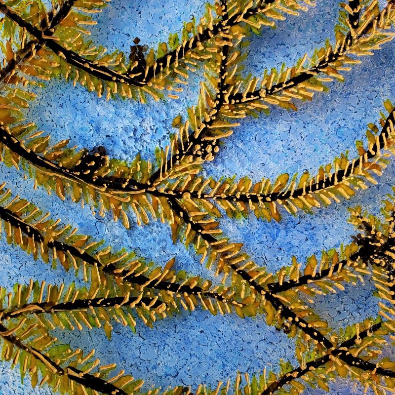 close up of detail on blue glass art bowl