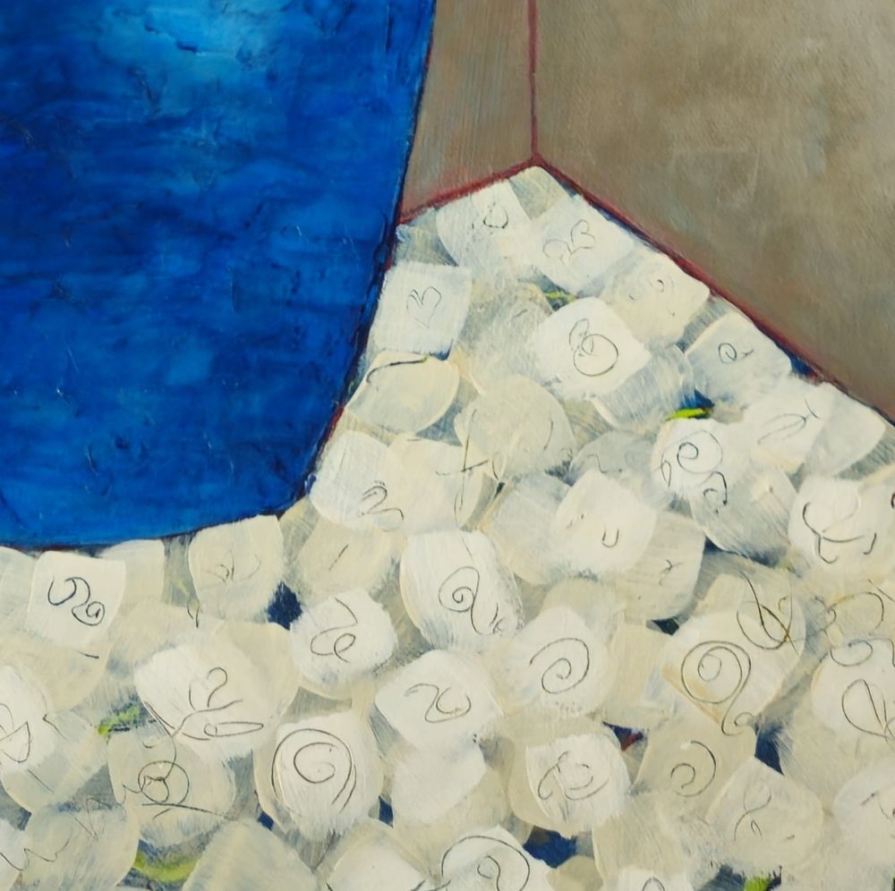 close up of detail on vase and table cloth