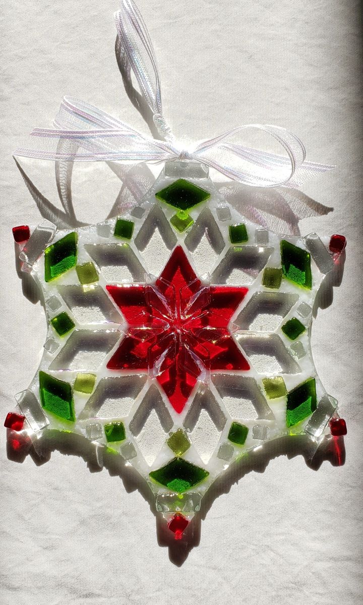 fused glass snowflake ornament in clear with red and green