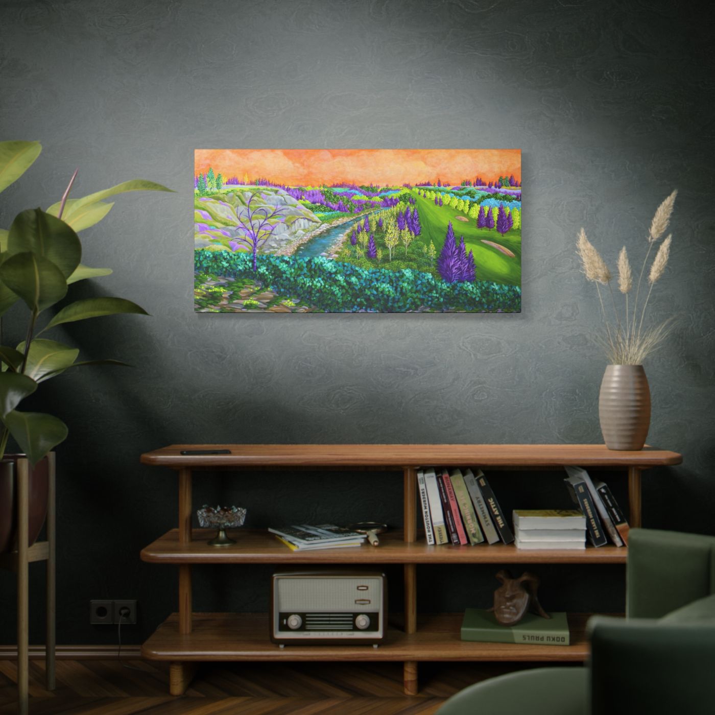 Painting of a colorful landscape on a wall above a wooden shelf with books and decor.