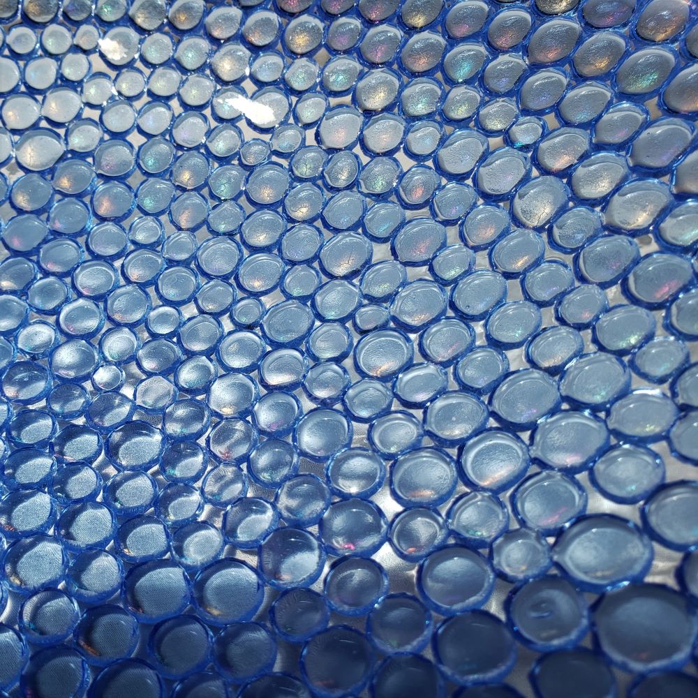 close up of the blue jelly tots on bowl