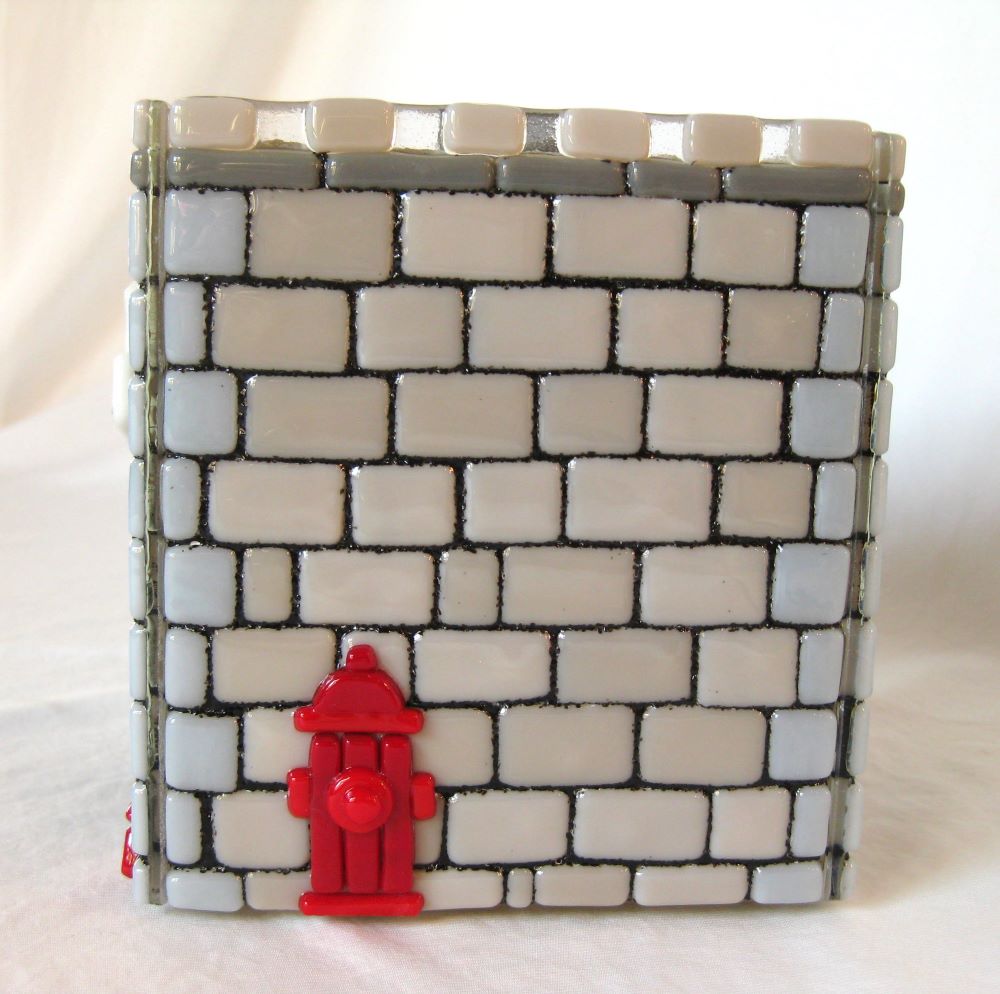 Side view of unique pet urn showing fire hydrant