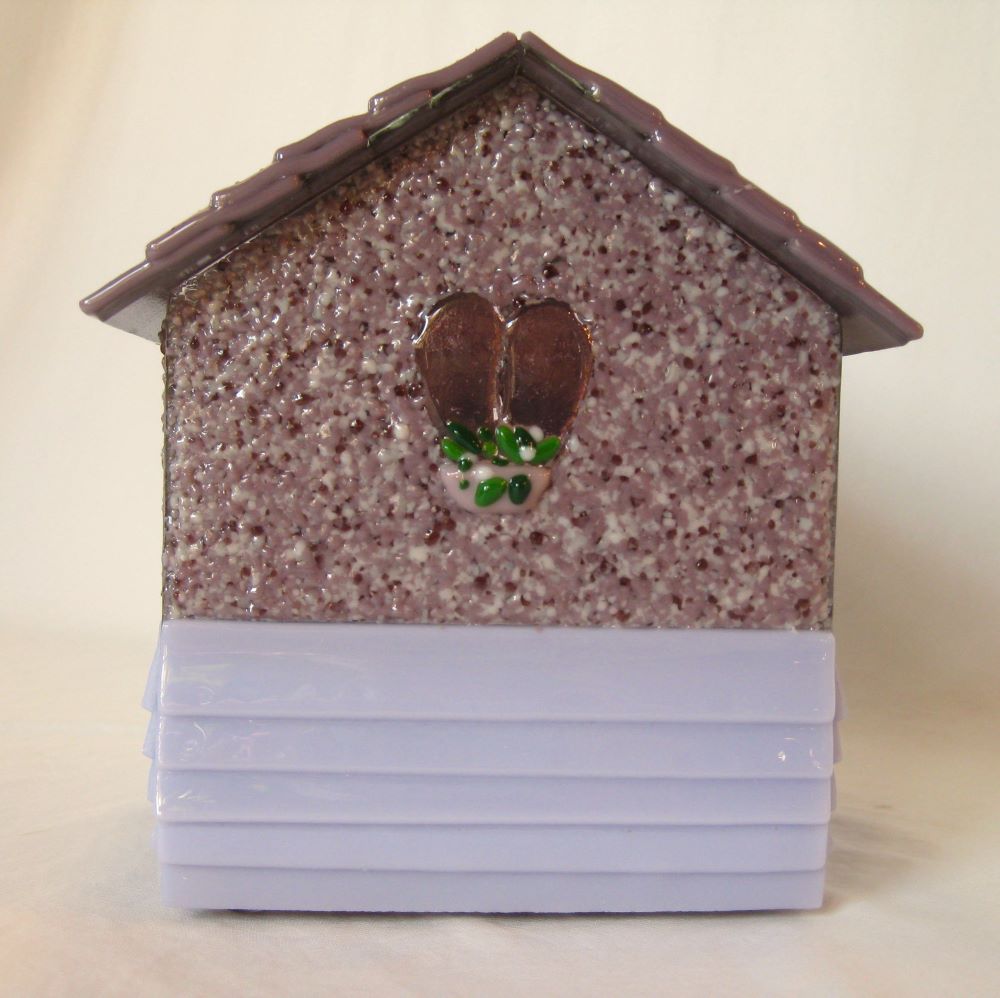 back view of little glass  house urn with heart shaped window