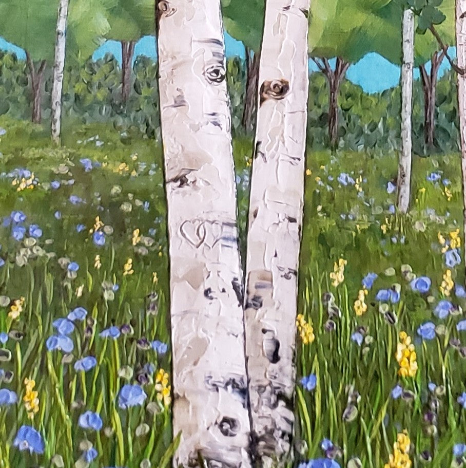 close up of the hearts carved into tree painting