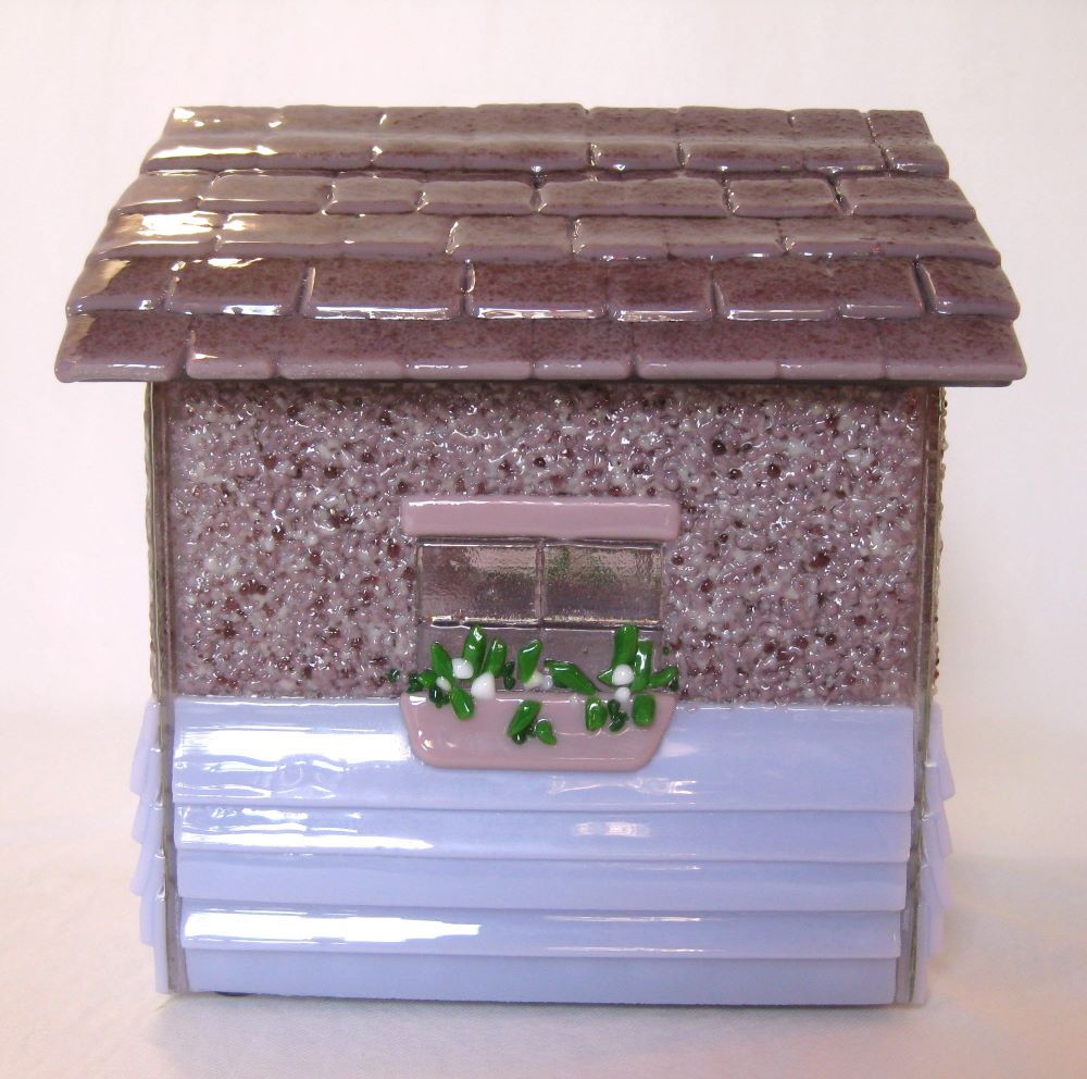 side view of custom glass house urn