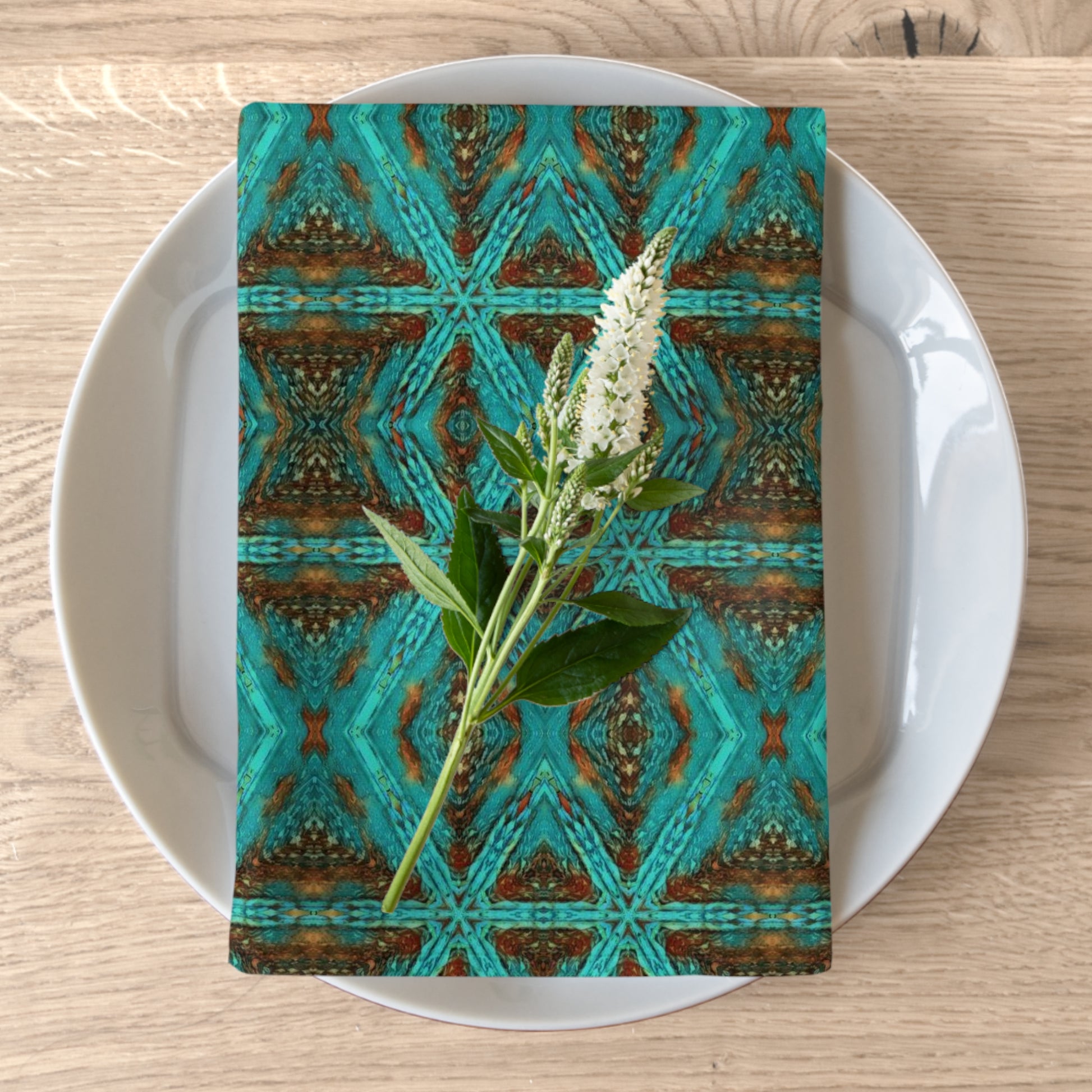 Cloth dinner napkins with a gorgeous western print in aqua and amber 