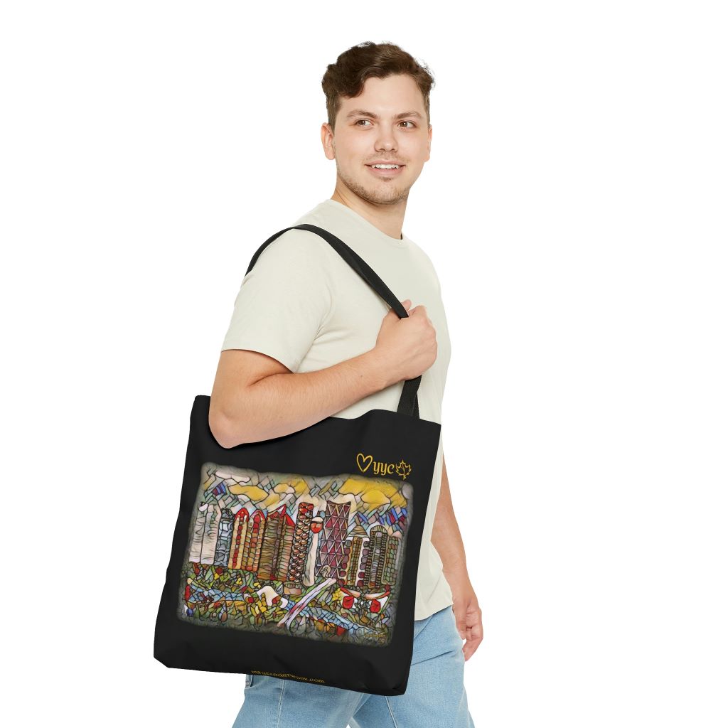 black tote bag shown on a man with calgary art