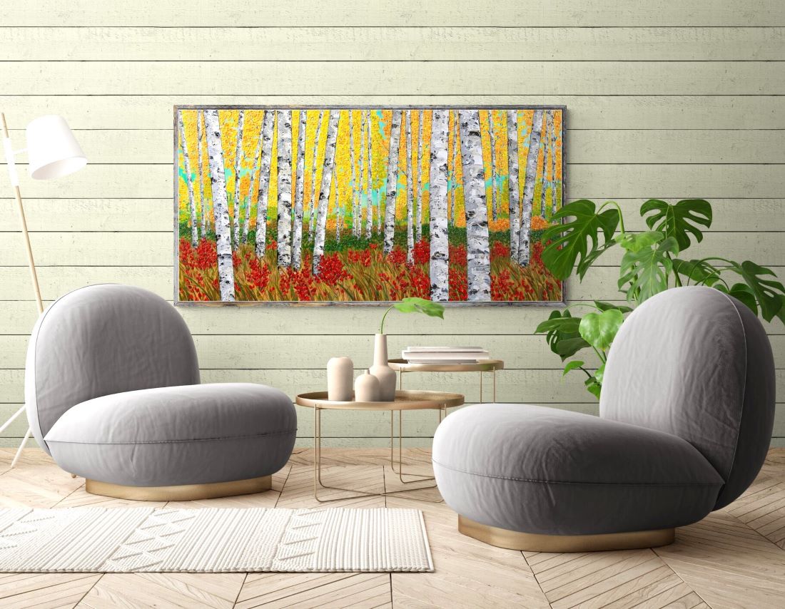 canvas art print of yellow trees painting shown in a living room setting