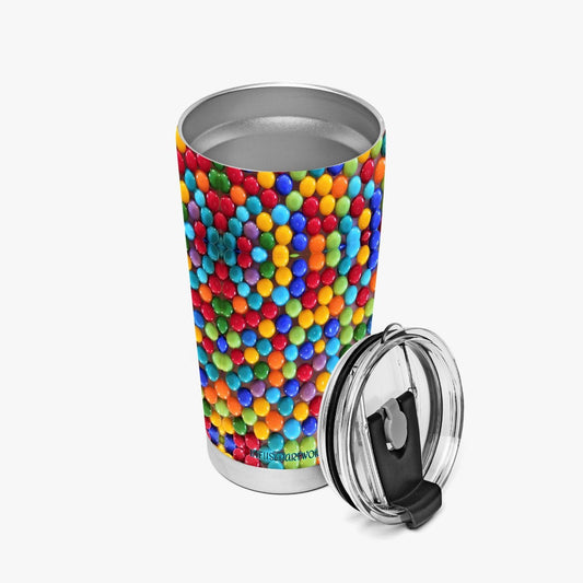 insulated coffee tumbler with rainbow candy print on it