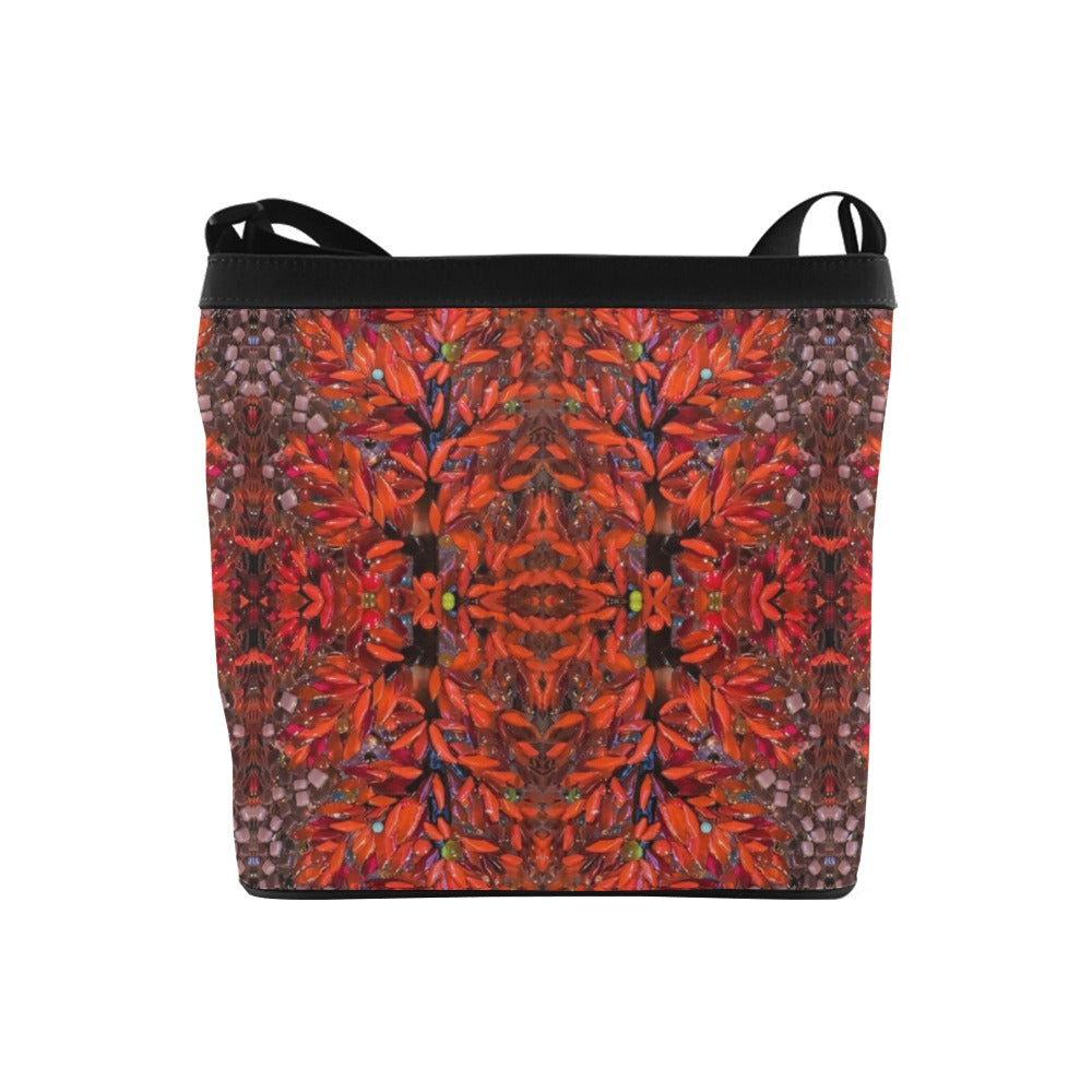 designer crossbody purse in black and red