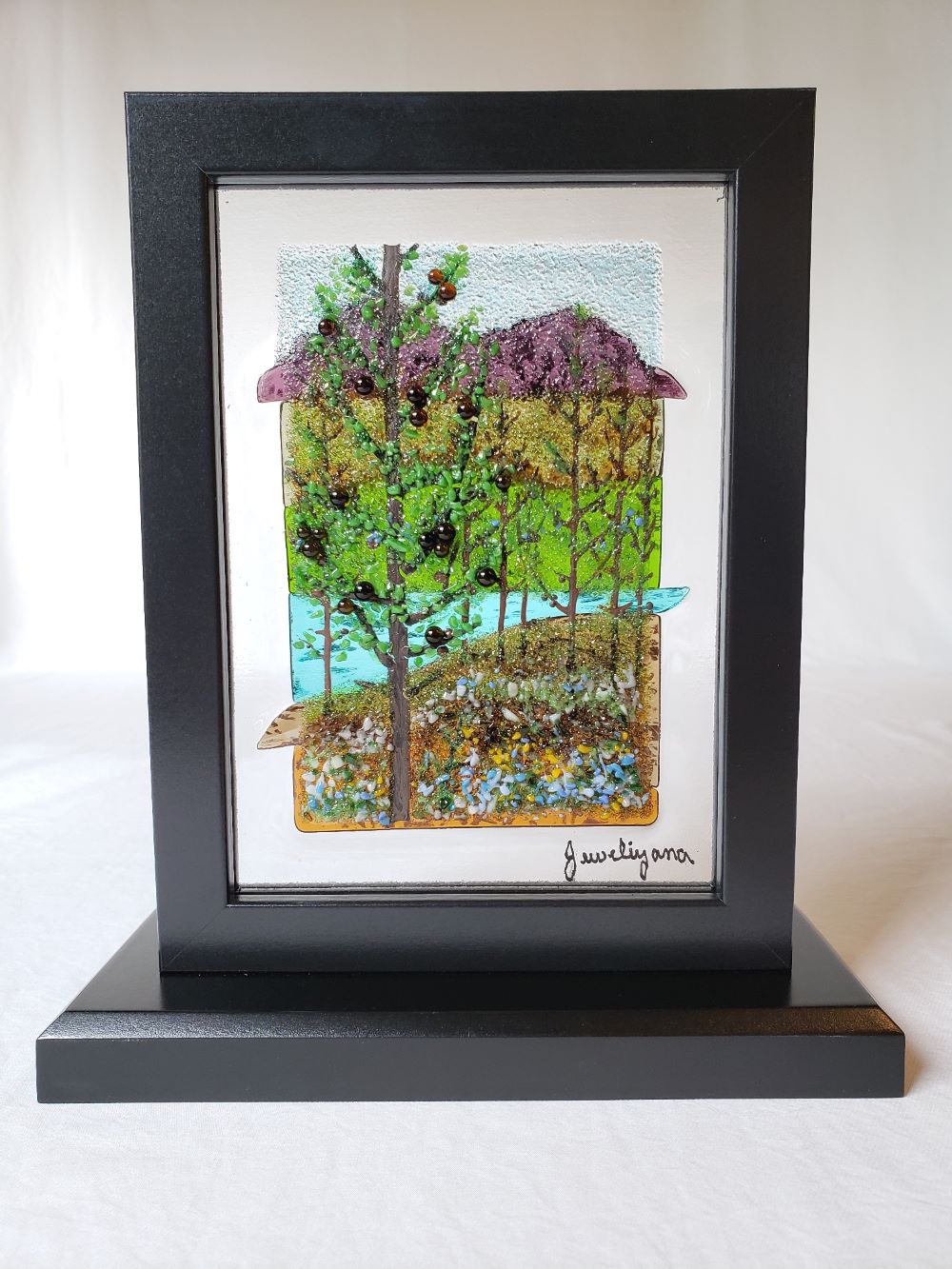 Summer lake scene of larch trees made of fused glass