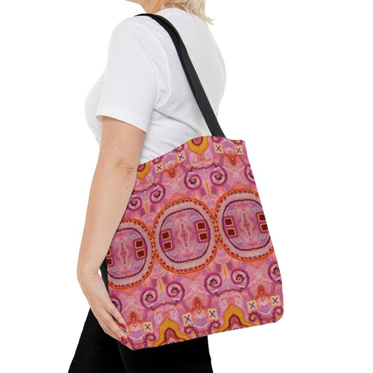 Pink tote bag on a womans shoulder