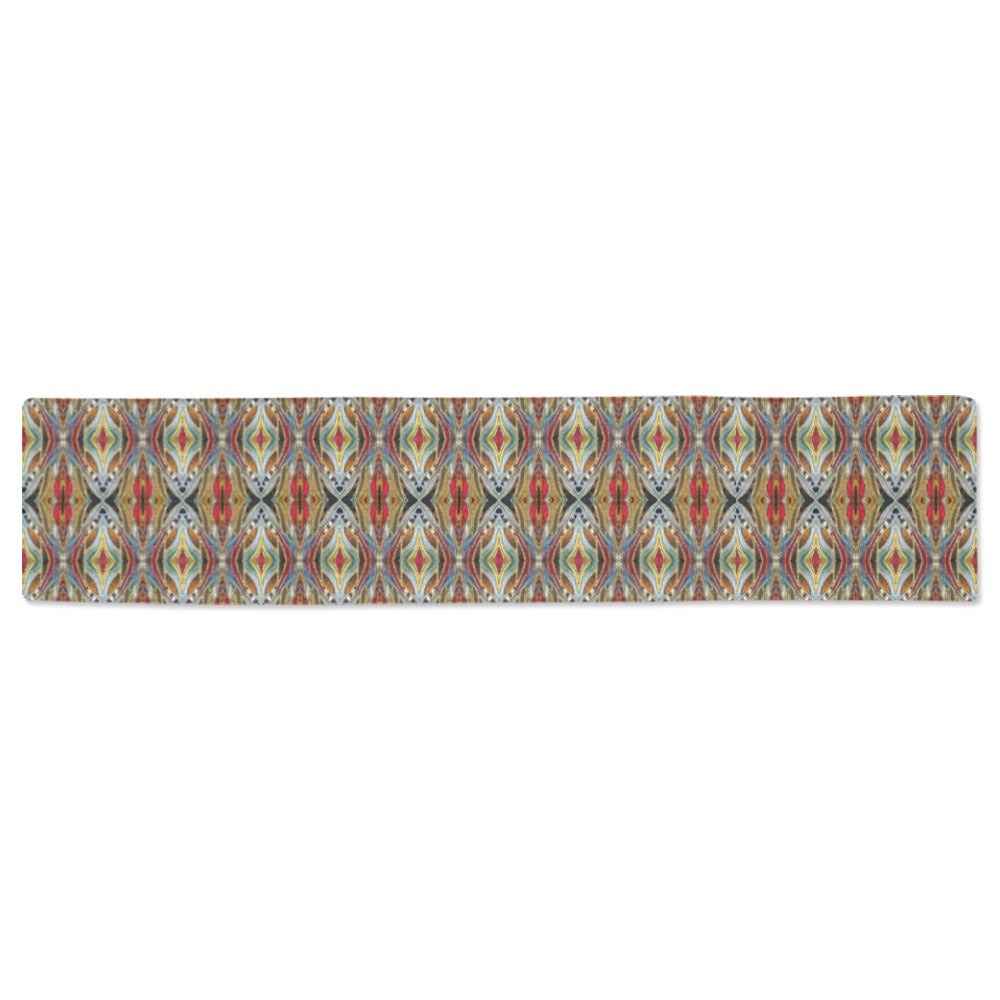 full view of the one tribe table runner with silver, red, and gold design 