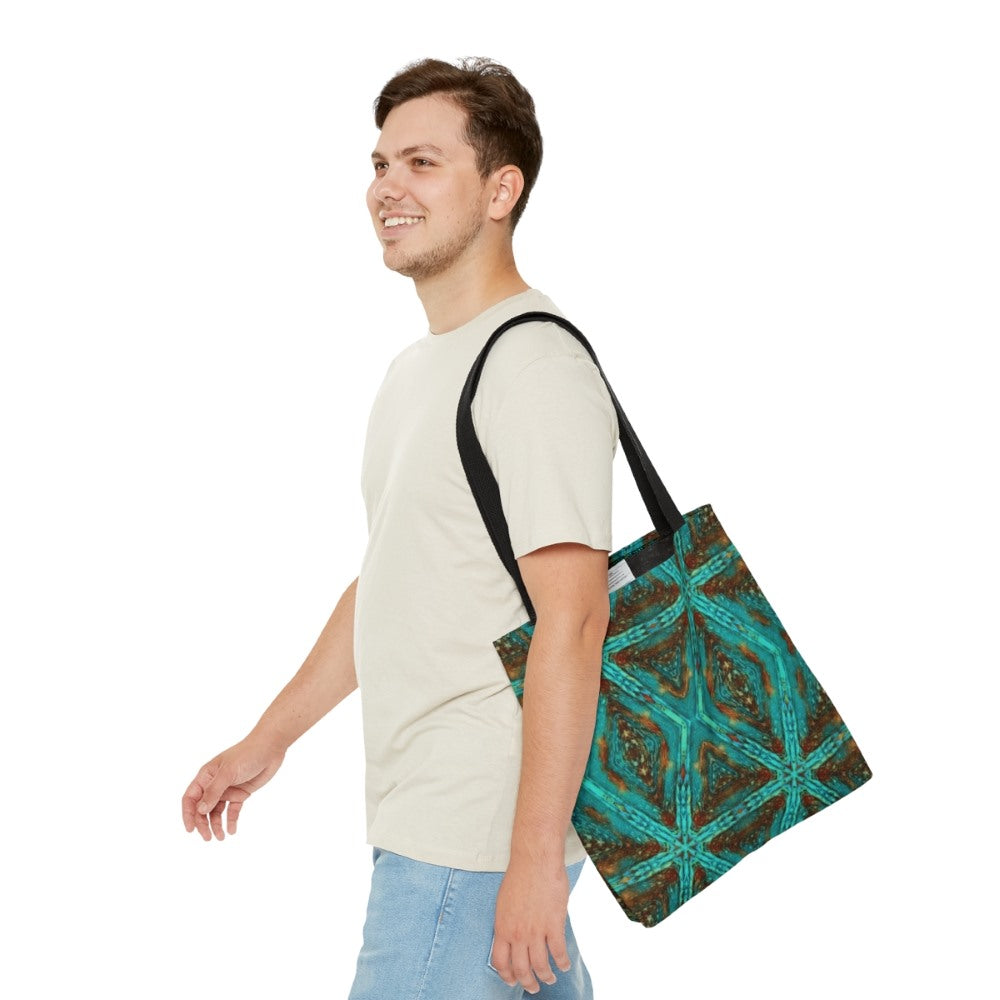 man carrying totebag with blue amber design