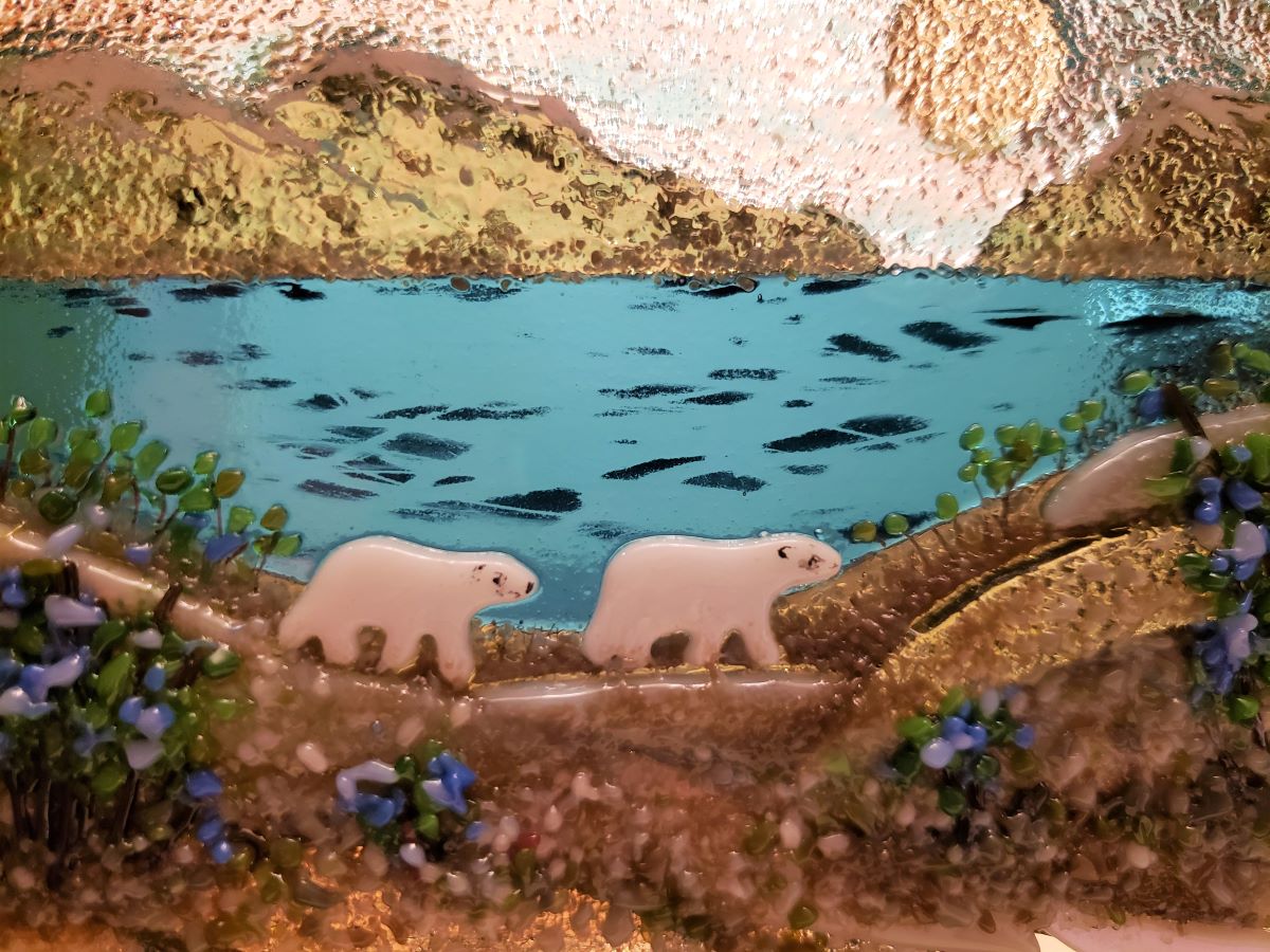 close up of glass polar bear art painting