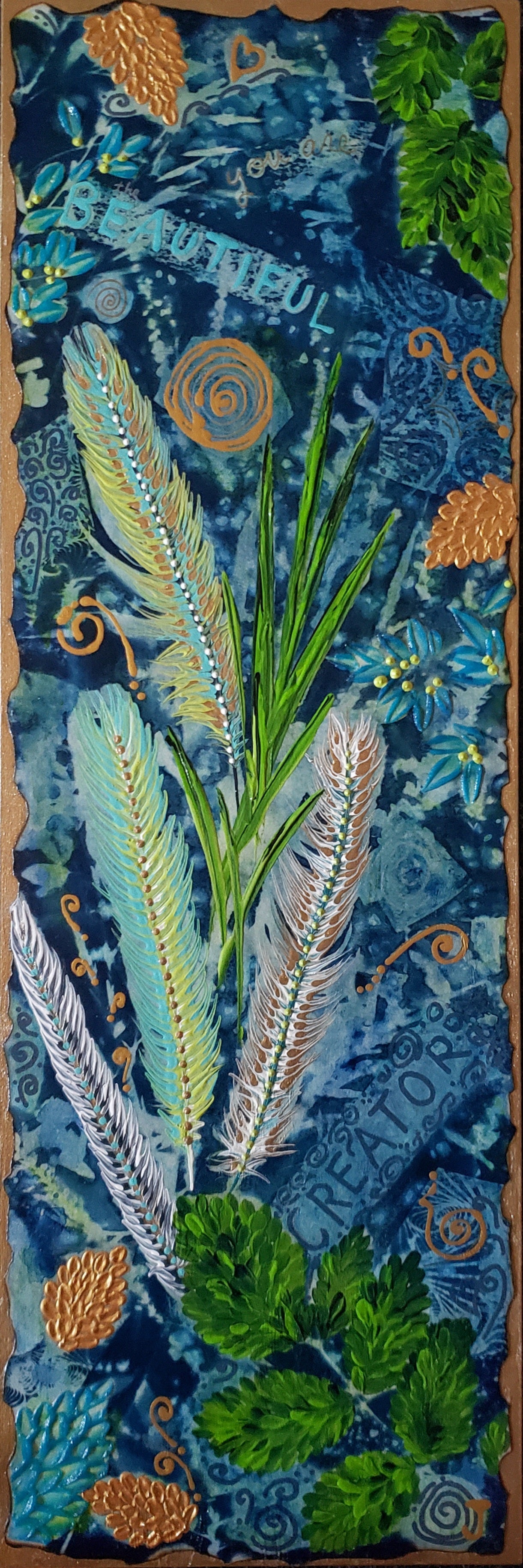 Cyanotype Sunprint of feathers n leaves in blues and greens with gold accents and a spiritual message enscribed