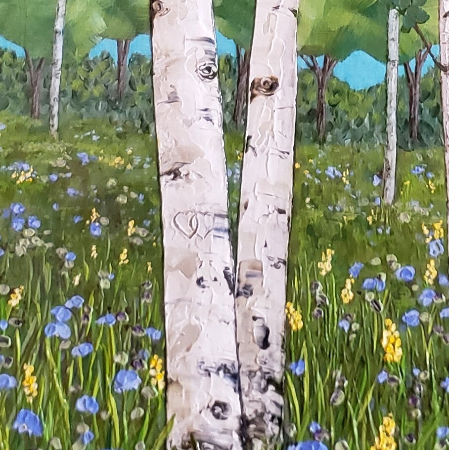close up of the hearts carved into tree painting 