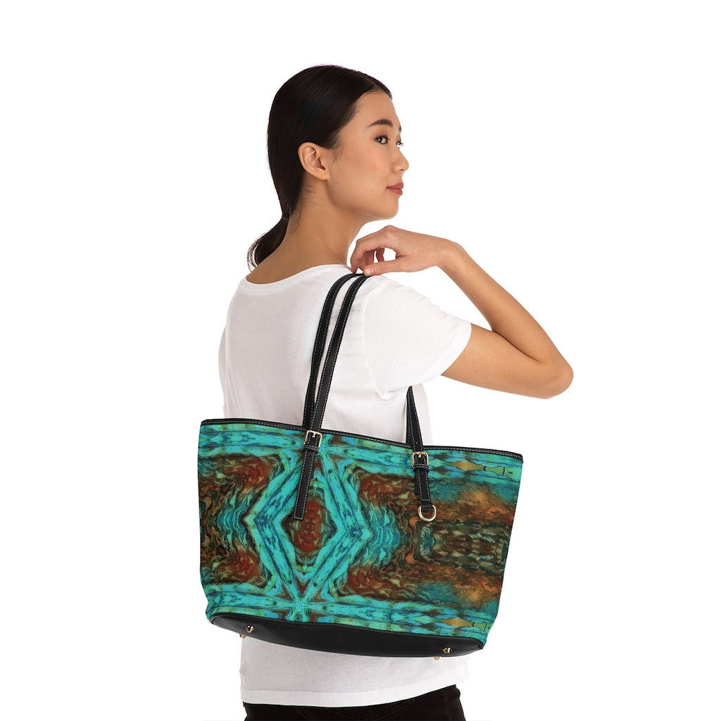Large shoulder bag option shown over womans shoulder