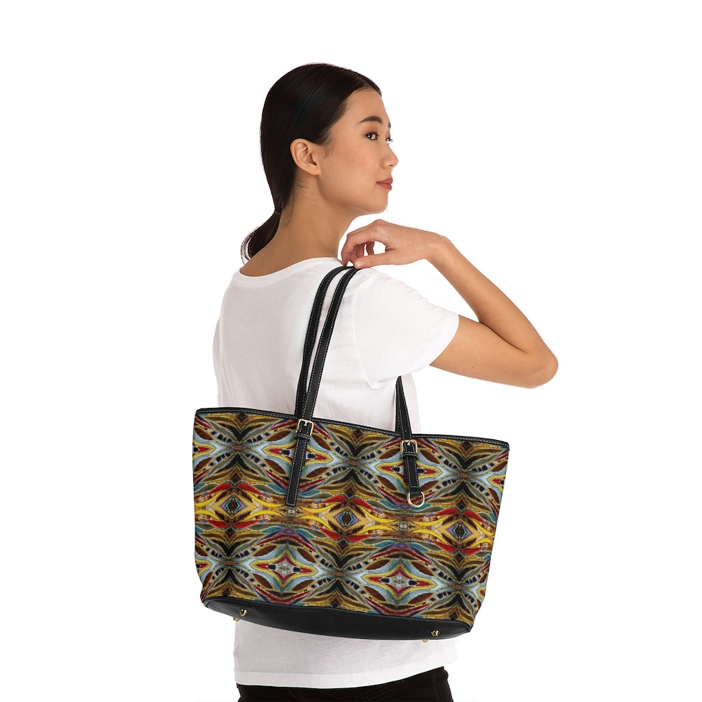 woman with designer bag slung over her shoulder